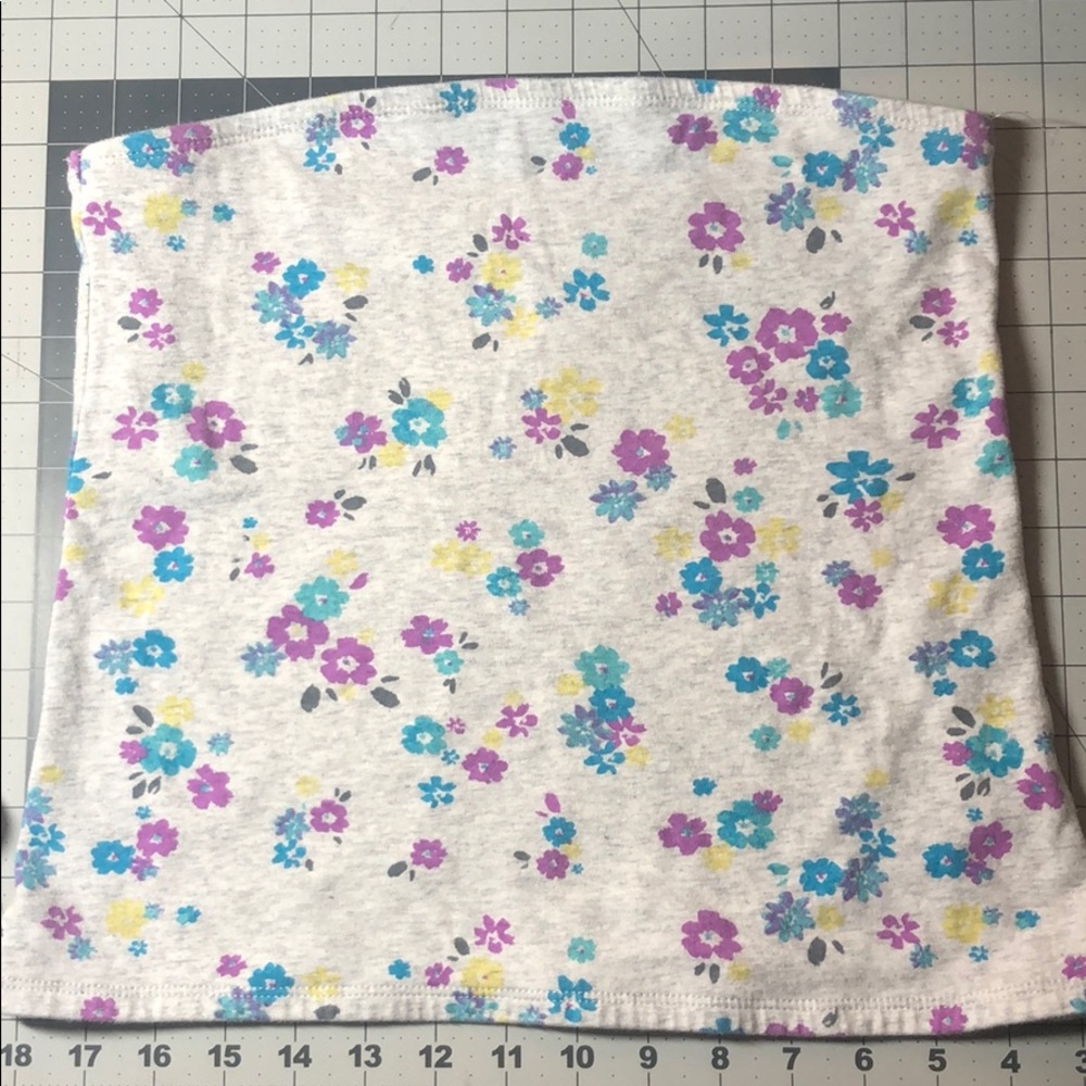 Justice flowered sleeveless crop top. NWOT